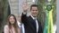 Venezuela's self-proclaimed interim president Juan Guaido waves at the press as he arrives for a meeting with ambassadors and representatives from European Union, in Brasilia, Brazil, Feb. 28, 2019. 