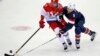 USA Tops Russia in Hockey; Austria, Sweden Get Gold