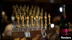 FILE - Oscar-shaped chocolates are pictured at a preview of the food and decor for the 87th Academy Awards' Governors Ball at the Ray Dolby ballroom in Hollywood, Calif., February 4, 2015. One marketing firm has promised $200,000 gift bags for celebrities
