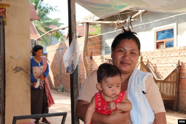 Srey Kunthear, 38, a garment worker for more than twenty years, talks to VOA Khmer on May 20, 2019, in her village in Chbar Ampov district about her experience in the census, which she says, enumerators spent less than 20 minutes, asking her about her family. (Phorn Bopha/VOA Khmer)