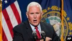 Former Vice President Mike Pence speaks at the annual Hillsborough County NH GOP Lincoln-Reagan Dinner, Thursday, June 3, 2021, in Manchester, N.H. (AP Photo/Elise Amendola)