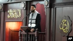 FILE - Imam Omar Suleiman speaks at the Islamic Center of Detroit in Detroit, January 26, 2024. President Biden's campaign manager has traveled to Michigan, where many Arab American leaders and top activists are angry over Biden's support for Israel and are unwilling to meet.