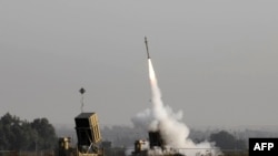 FILE - An Israeli missile launched from the Iron Dome defense missile system, designed to intercept and destroy incoming short-range rockets and artillery shells, is pictured in the southern Israeli city of Sderot, Nov. 12, 2019.