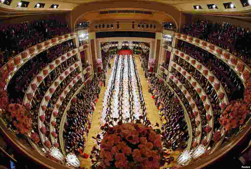 Members of the opening committee perform at the Opera Ball in Vienna, Austria, Feb. 27, 2014. The 18 to 24-year-olds spent weeks rehearsing for a performance that lasts just three or four minutes but had a huge audience at home and abroad.