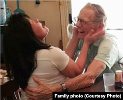 Nguyễn Thị Kim Nga, left, embraces her American father, Gary Wittig, when they met for the first time.