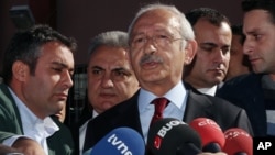 FILE - Turkey's main opposition Republican People's Party leader Kemal Kilicdaroglu is seen speaking to the media in Ankara, Turkey, Nov. 1, 2015. Of Thursday's court decision he said it "revealed how right in our criticisms we were in the past."