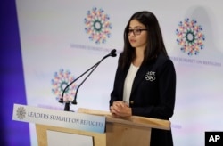 Yusra Mardini, a swimming for the Refugee Olympic Team, speaks during the Leaders Summit on Refugees during the 71st session of the United Nations General Assembly at UN headquarters, Sept. 20, 2016.