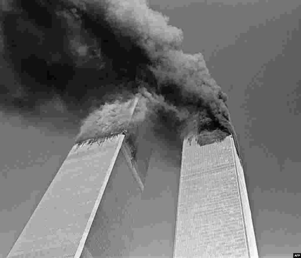 Smoke billows from the twin towers of the World Trade Center in New York Tuesday Sept. 11, 2001. In one of the most horrifying attacks ever against the United States, terrorists crashed two airliners into the World Trade Center in a deadly series of blows