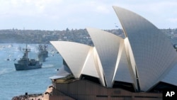 FILE - In this Oct. 4, 2013, file photo, the Opera House is seen. A report released March 13, 2024, says migrants in Australia often work jobs beneath their skill level and are paid less than Australian workers.