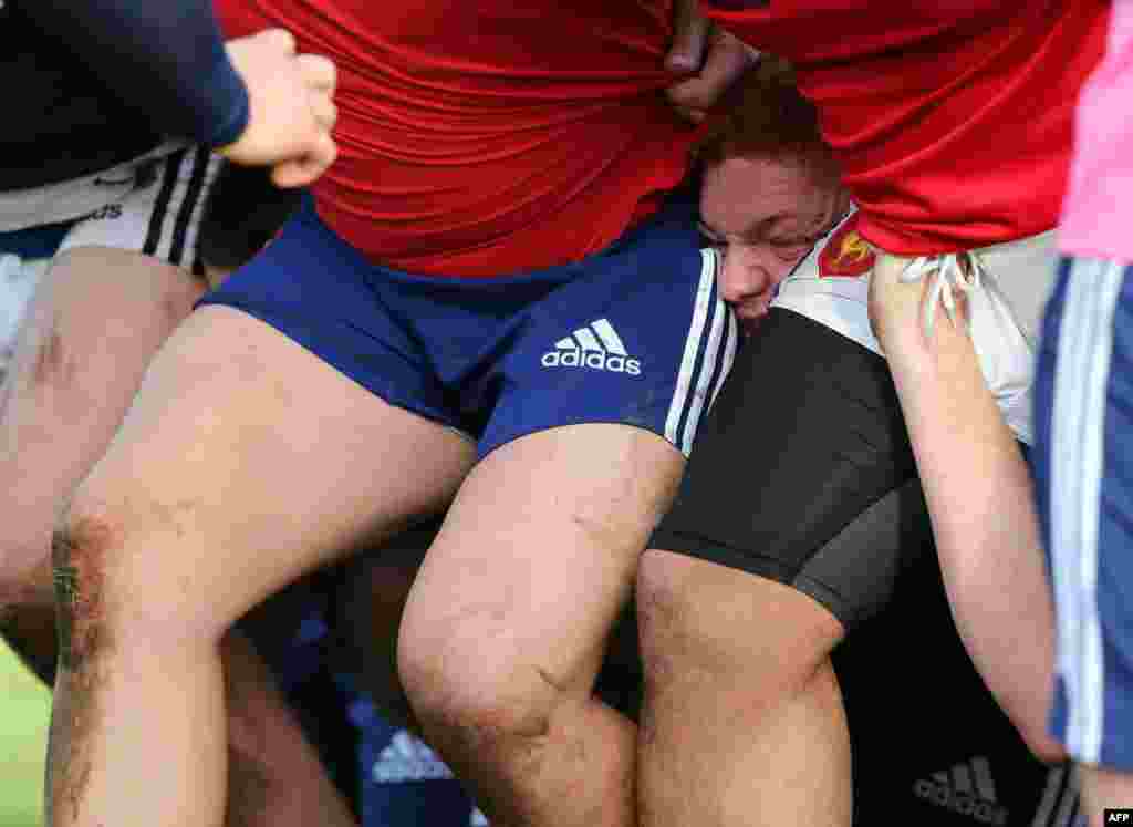 Félix Lambey of France (C) takes part in a team training session at Dilworth College in Auckland, New Zealand, ahead of their second match in the Junior Rugby World Championship.