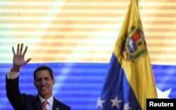 Venezuelan opposition leader Juan Guaido, who many nations have recognized as the country's rightful interim ruler, attends a forum to discuss a security plan for the country, in Caracas, Venezuela, April 11, 2019.