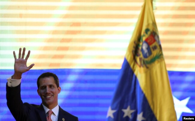 Venezuelan opposition leader Juan Guaido, who many nations have recognized as the country's rightful interim ruler, attends a forum to discuss a security plan for the country, in Caracas, Venezuela, April 11, 2019.