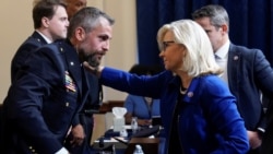 Policajac Michael Fanone sa republikanskom članicom Predstavničkog doma Liz Cheney.