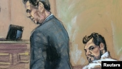 Mehmet Hakan Atilla, right, who works for Halkbank in Turkey, is shown in this courtroom sketch with his attorney Gerald J. DiChiara as he appears in Manhattan federal court in New York, March 28, 2017. 
