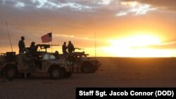 FILE - Members of 5th Special Forces Group (A) conducting 50. Cal Weapons training during counter ISIS operations at Al Tanf Garrison in southern Syria.