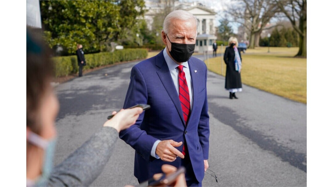 President Joe Biden speaks to reporters on the South Lawn of the White House in Washington, before boarding Marine One helicopter, Feb. 27, 2021, for the short trip to Andrews Air Force Base, Md., and then on to Wilmington, Del.