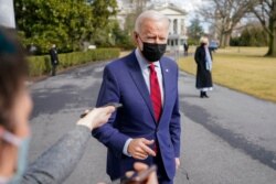 President Joe Biden speaks to reporters on the South Lawn of the White House in Washington, before boarding Marine One helicopter, Feb. 27, 2021, for the short trip to Andrews Air Force Base, Md., and then on to Wilmington, Del.