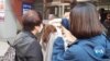 With Masks, Hand Sanitizer, and Gloves, South Koreans Vote During Pandemic