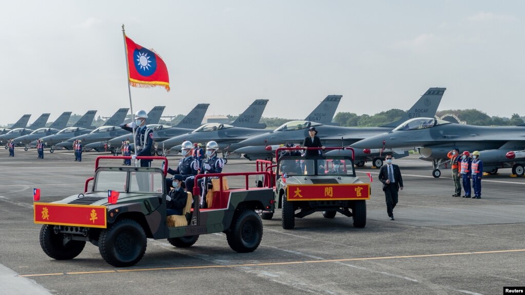 FILE - Taiwan President Tsai Ing-wen oversees the commission of the first squadron of the upgraded F-16V fighters in Chiayi Air Force Base, Taiwan in this handout picture provided by Taiwan Presidential Office on November 18, 2021. (Taiwan Presidential Office/Handout via REUTERS)