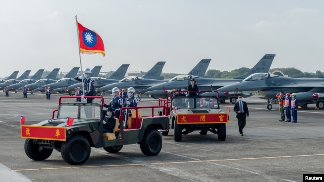 FILE - Taiwan President Tsai Ing-wen oversees the commission of the first squadron of the upgraded F-16V fighters in Chiayi Air Force Base, Taiwan in this handout picture provided by Taiwan Presidential Office on November 18, 2021. (Taiwan Presidential Office/Handout via REUTERS)