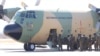 FILE - Botswana soldiers board a Botswana Defense Force plane to Mozambique. (Mqondisi Dube/VOA)