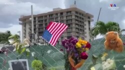 Ֆլորիդայում մասնակի փլուզված շենքի մոտակայքում մարդիկ ծաղիկներ են դնում զոհերի հիշատակին