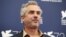 Mexican film director Alfonso Cuaron, a member of the jury at the 72nd Venice Film Festival, poses during a photo call for the event in Venice, Italy, Sept. 2, 2015.