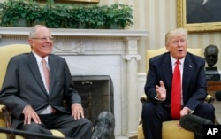 President Donald Trump meets with Peruvian President Pedro Pablo Kuczynski in the Oval Office of the White House in Washington, Feb. 24, 2017.