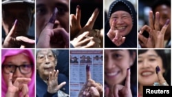A combination picture shows people raising their finger after voting during an election for Jakarta's governor in Jakarta, Indonesia February 15, 2017. 