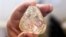 A 709-carat diamond, found in Sierra Leone and known as the "Peace Diamond", is displayed during a tour ahead of its auction, at Israel's Diamond Exchange, in Ramat Gan, Israel, Oct. 19, 2017. 