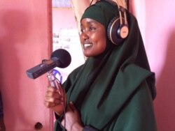Ikra Dagan is seen rehearsing a script for a podcast, at the Bokolmanyo refugee camp, in Bokolmanyo, Ethiopia. (M. Birungi/VOA)