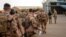 FILE - French Barkhane force soldiers who wrapped up a four-month tour of duty in the Sahel leave their base in Gao, Mali, June 9, 2021. 
