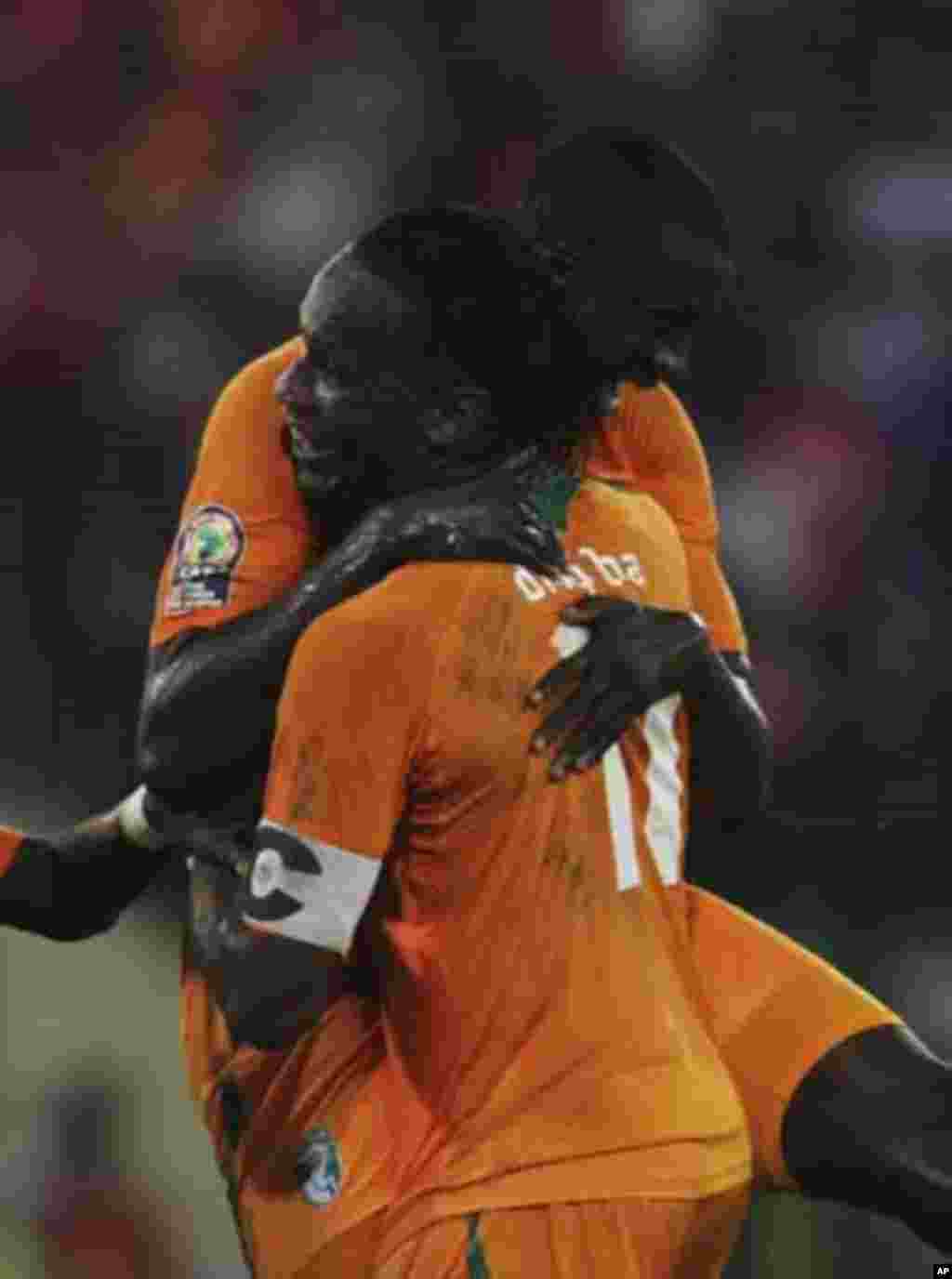 Yaya Toure (L) and Didier Drogba of Ivory Coast celebrate after scoring against Equatorial Guinea during their quarter-final match at the African Nations Cup soccer tournament in Malabo February 4, 2012.