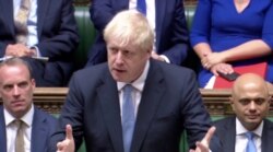 FILE - Britain's Prime Minister Boris Johnson speaks at the House of Commons in London, July 26, 2019.