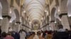 The acting Latin Patriarch of Jerusalem Pierbattista Pizzaballa leads a Christmas midnight mass at Saint Catherine's Church, in the Church of the Nativity, in Bethlehem, in the Israeli-occupied West Bank, Dec. 25, 2018.