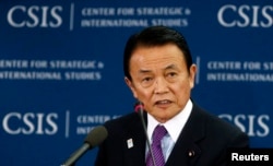 FILE - Japanese Finance Minister Taro Aso.