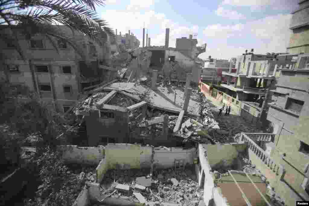 غزہ میں&nbsp;اسرائیلی بمباری کا نشانہ بننے والی عمارتیں۔