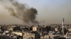 资料照片：2024年3月27日，在以色列与巴勒斯坦激进组织哈马斯之间持续不断的冲突中，加沙地带南部拉法的建筑物上空浓烟滚滚。（法新社照片）