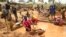 Gold miners work at a mining site in the Cameroon town of Betare Oya, April 4, 2018.