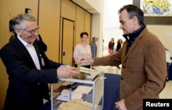 French Ambassador to the U.S. Gerard Araud casts his ballot as he joins French citizens living in the United States voting in the French presidential runoff between Emmanuel Macron and Marine Le Pen, at the French Embassy in Washington, May 6, 2017.