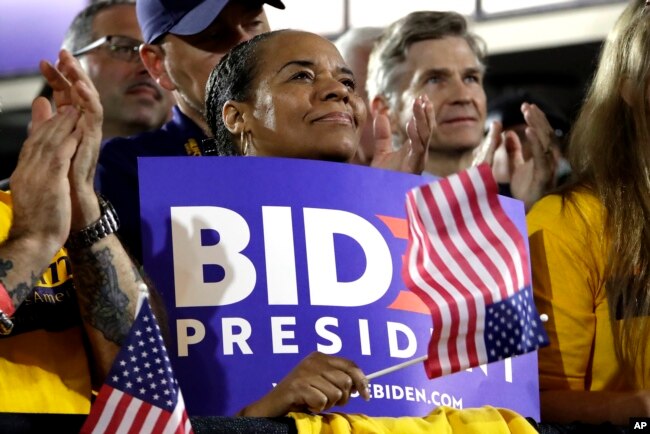 People applaud as former Vice President and Democratic presidential candidate Joe Biden speaks during a rally at the Teamster Local 249 Hall in Pittsburgh, April 29, 2019.