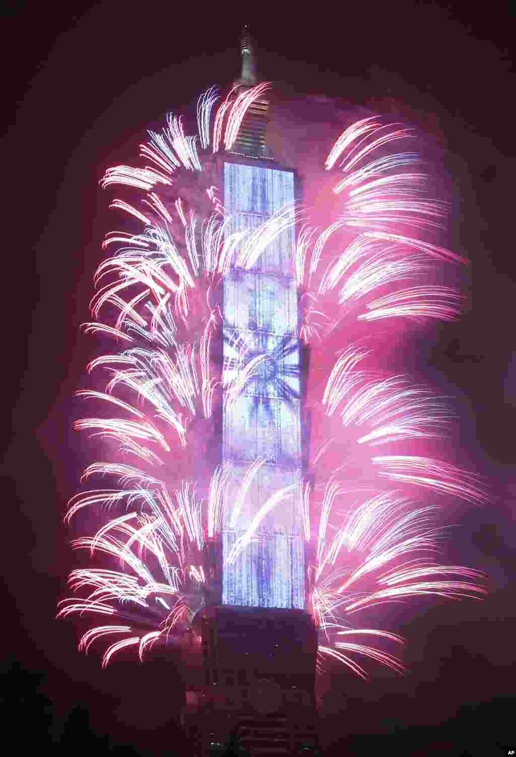 Fireworks explode from the Taipei 101 building during the New Year&#39;s celebrations in Taipei, Taiwan.