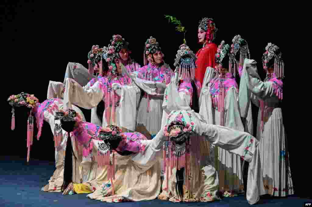 Actresses on stage during the performance of &#39;The Peony Pavilion&#39;, also called &#39;The Return of Soul&#39; play at the Shanghai Grand Theater, in Shanghai, China, April 25, 2021.