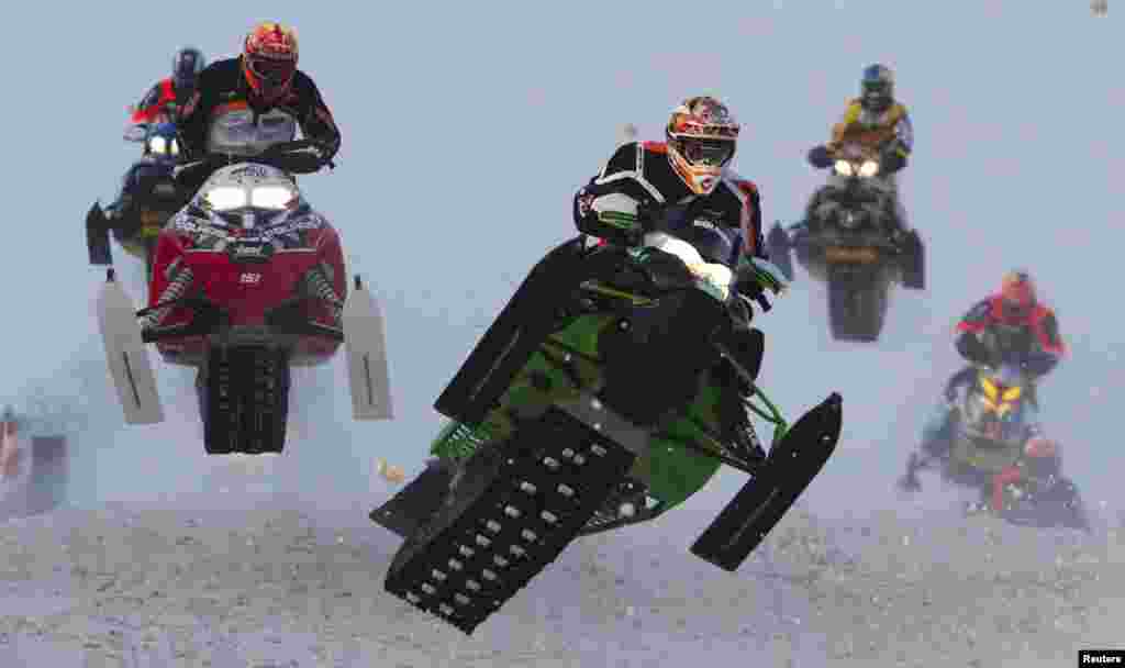 Men&#39;s Pro Open riders compete in the Canadian Snowcross Racing Association&#39;s (CSRA) Kawartha Cup in Lindsay, Ontario. The snowmobile event is part of CSRA&#39;s professional circuit of racing in Ontario and Quebec.