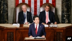 Japanese Prime Minister Shinzo Abe speaks before a joint meeting of Congress on Capitol Hill in Washington, April 29, 2015.