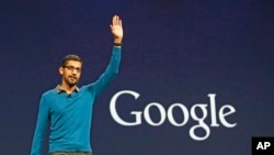 Sundar Pichai, senior vice president of Android, Chrome and Apps, waves after speaking during the Google I/O 2015 keynote presentation in San Francisco, May 28, 2015. 
