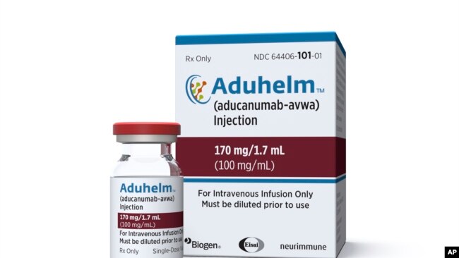 FILE - This image provided by Biogen on Monday, June 7, 2021 shows a vial and packaging for the drug Aduhelm.