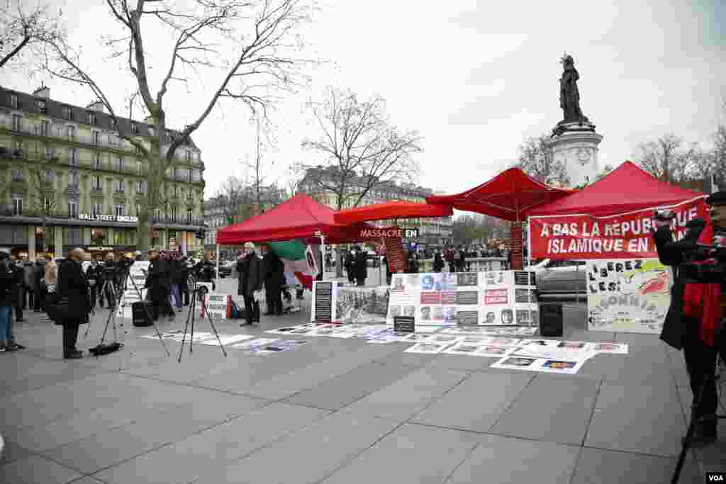 اعتراضات فعالان سیاسی و مدنی ایران به سفر حسن روحانی به پاریس