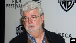 FILE - George Lucas attends the Tribeca Talks: Director Series during the Tribeca Film Festival in New York, April 17, 2015.
