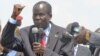 South Sudan Vice President James Wani Igga, shown here addressing demonstrators at a peace rally in Juba in March 2014, urges South Sudanese who have fled the country to come home and help build a unified nation.